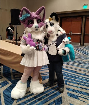 Megaplex 2025 Featuring Palette the Snow Leopard! Taken during Plush Bingo hosted by MadShyArts; Photo Credits to Jengolin on X