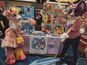 Megaplex 2024 Dealers Den Pictured with w0rmoo and Emmy the Corgii